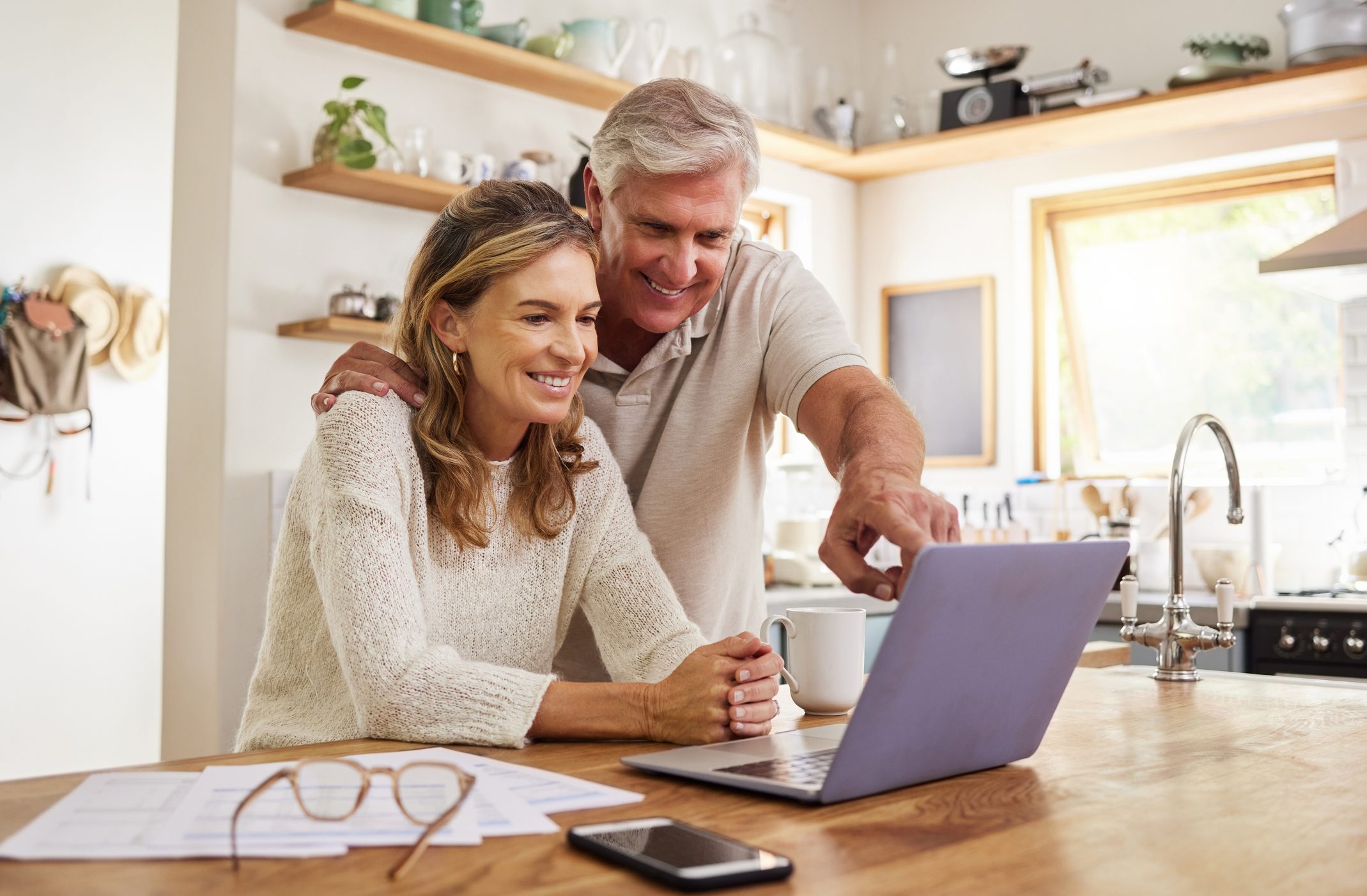 Older couple enjoying online activity